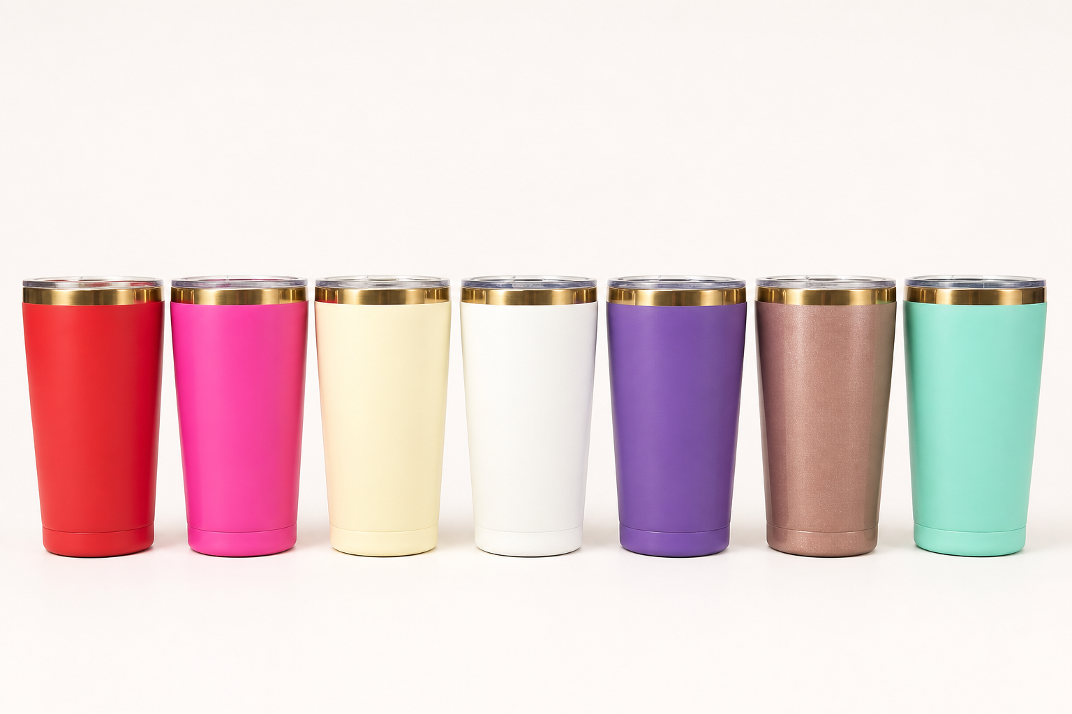 Seven fully visible straight tumblers in red, hot pink, ivory, white, purple, taupe glitter and mint